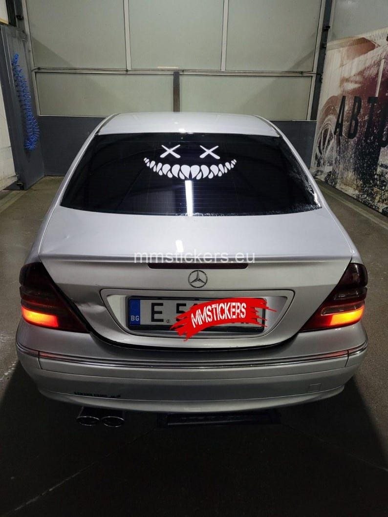 Sticker voiture sourire effrayant - Sticker vitre arrière avec yeux et dents
